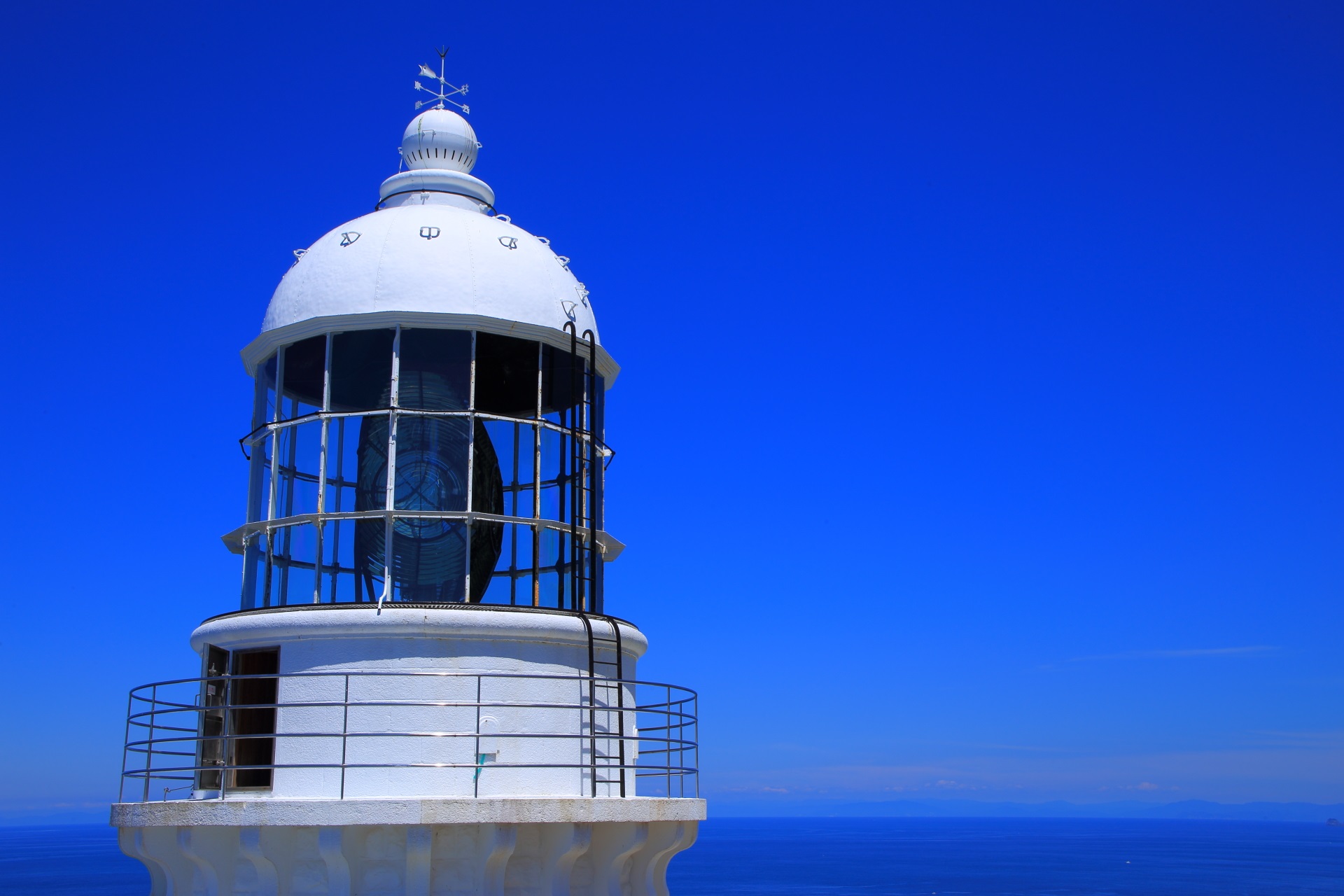 Kyoga-Misaki Lighthouse in Kyotango and blue sea and blue sky
