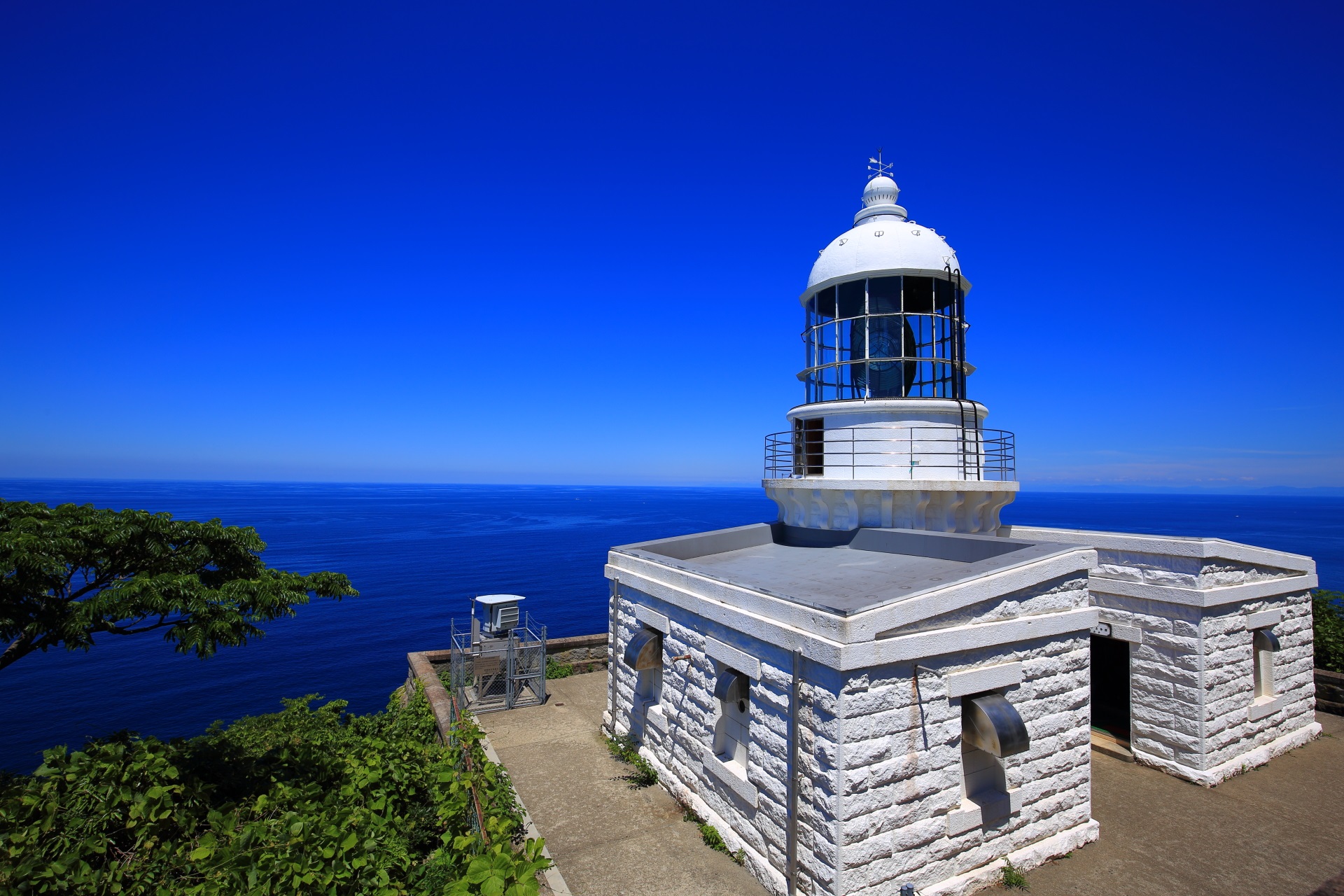 White Kyoga-Misaki Lighthouse in Kyoto and a beautiful sea